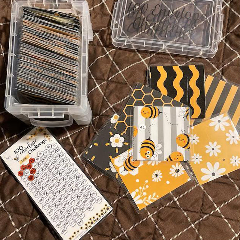 đHerausforderungsbox-Set enthĂ€lt 100 BriefumschlĂ€ge