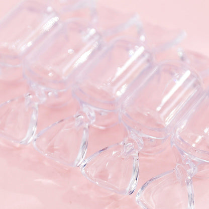 Transparente Schmuckschatulle in Bonbonform